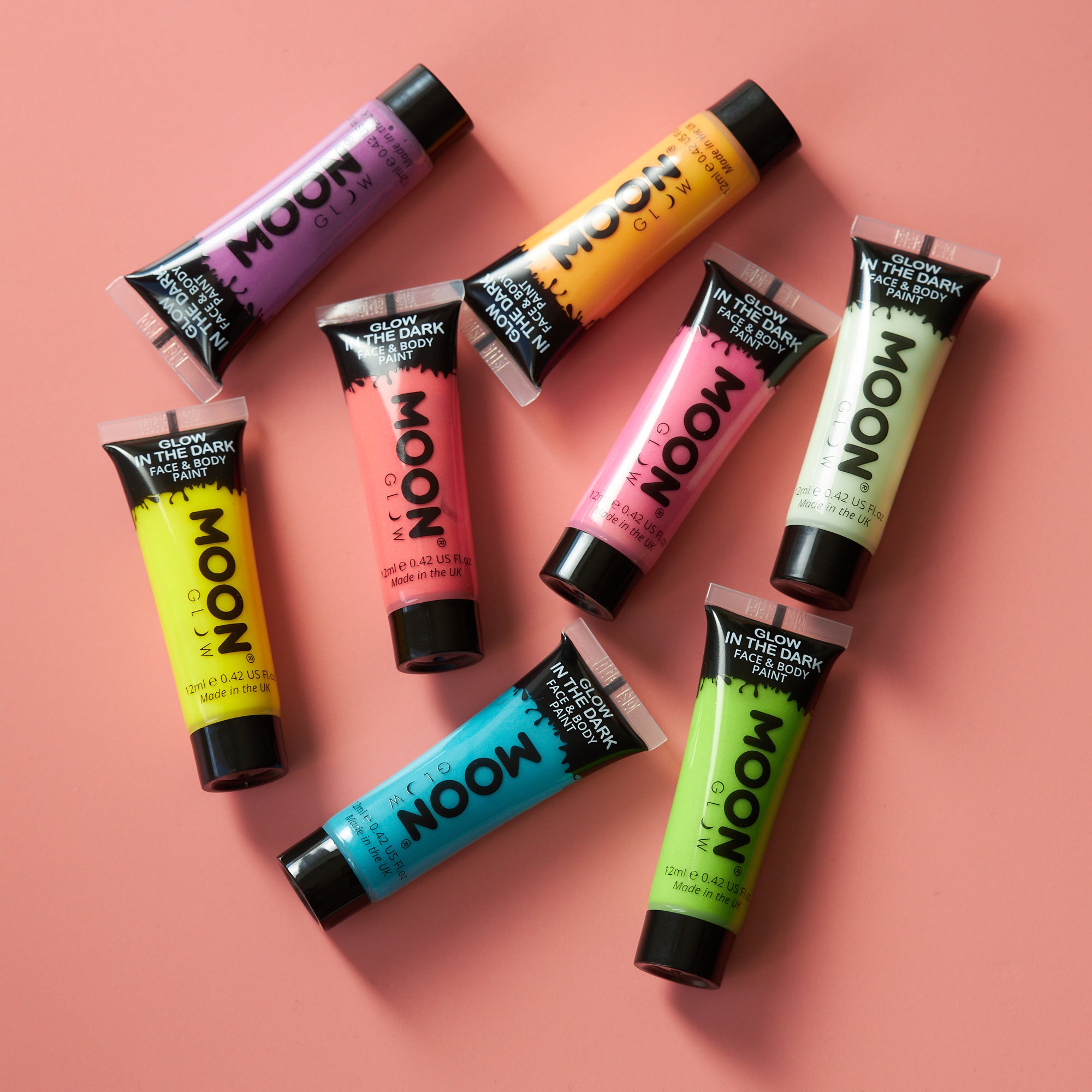 Moon Glow - Blacklight Neon Face Paint Stick / Body Crayon makeup for the  Face & Body - Pastel set of 4 colours - Glows brightly under blacklights